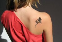 Black Feminine Rose Tattoo On Girl Right Back Shoulder intended for proportions 1024 X 780