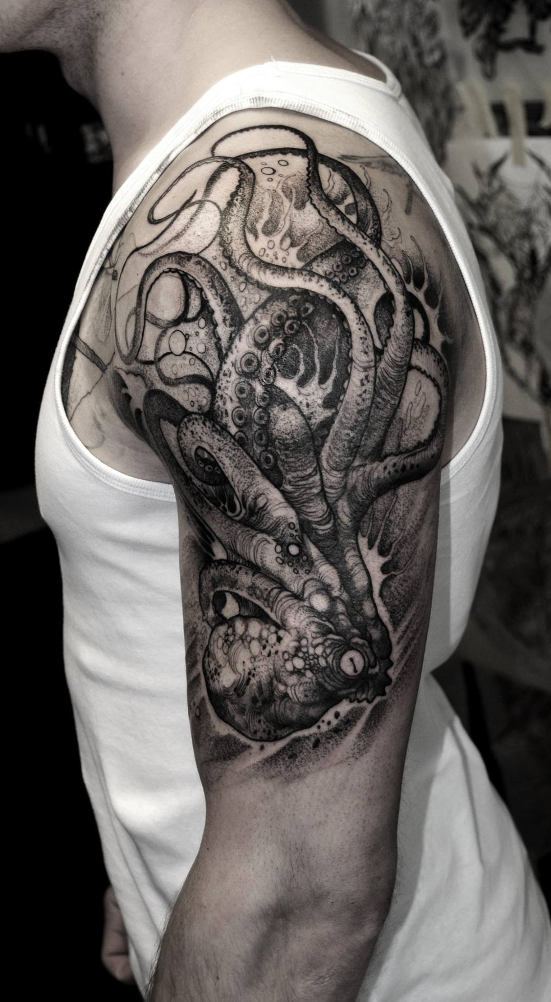 Black Ink Dotwork Octopus Tattoo On Man Left Shoulder for size 1127 X 2048