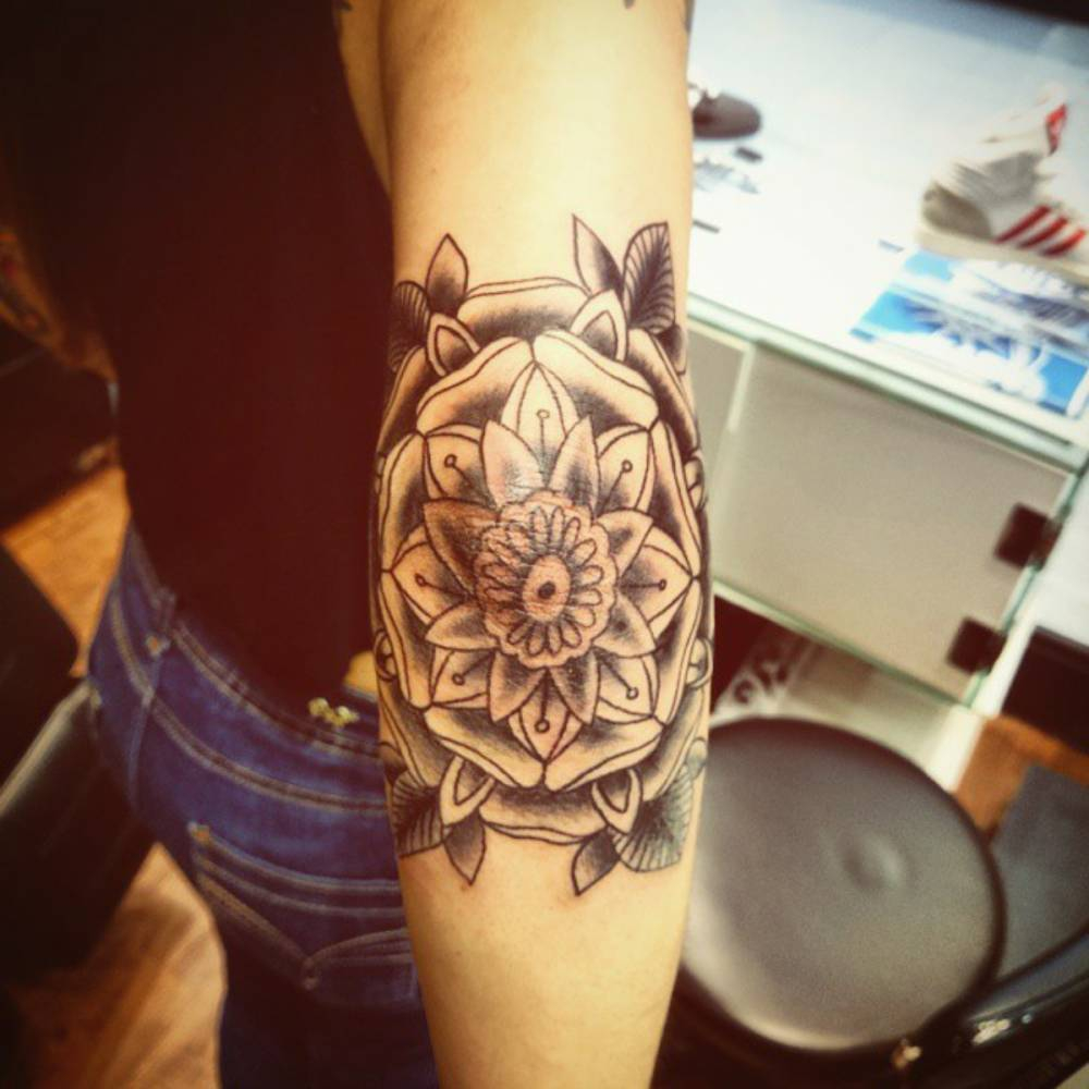 Black Ink Mandala Flower Tattoo On Girl Right Elbow pertaining to size 1000 X 1000
