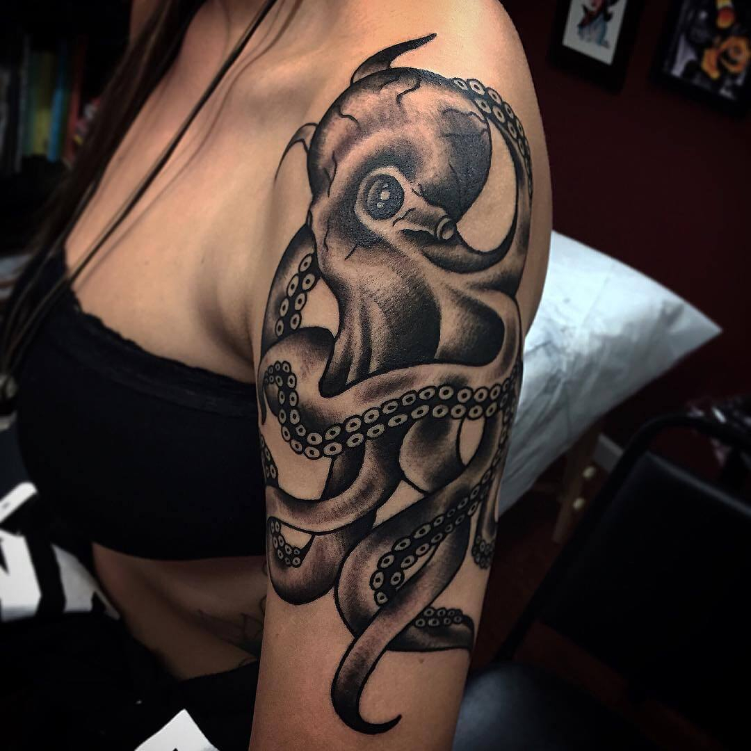 Black Ink Octopus Tattoo On Women Left Shoulder in size 1080 X 1080