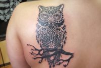 Black Ink Tribal Owl On Branch Tattoo On Girl Left Back Shoulder with regard to size 1080 X 1080
