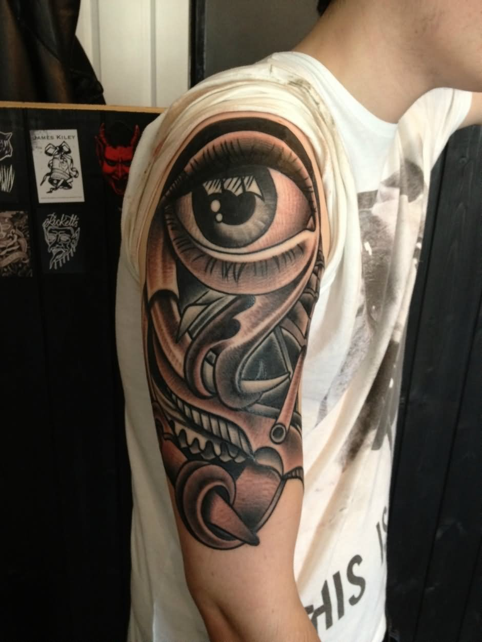 Black White Eye Held In Hands Tattoo On Bicep Gothic Tattoo Uk in proportions 940 X 1253
