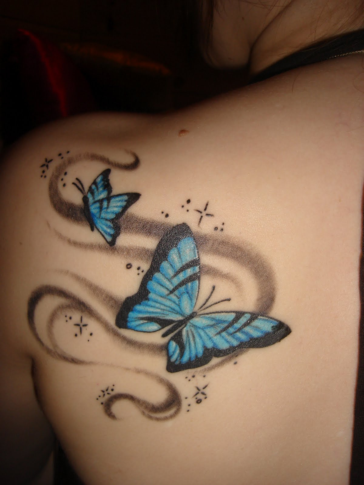 Blue Butterflies Tattoos On Back Shoulder For Girls Tattooshunt in size 1200 X 1600