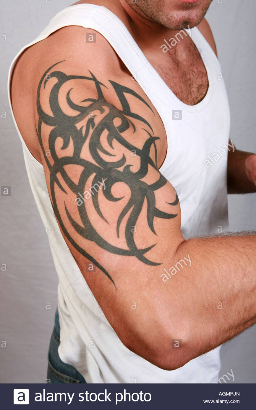 Closeup Of Muscular Male Bicep And Shoulder With Green Tattoo Body throughout dimensions 866 X 1390