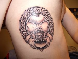 Grey Ink Irish Claddagh Tattoo On Rib Cage For Men inside proportions 1280 X 960