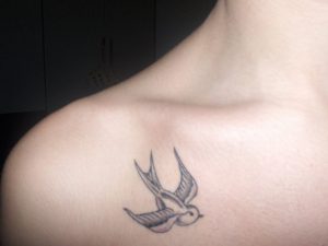 Grey Ink Sparrow Tattoo On Front Shoulder throughout sizing 1600 X 1200