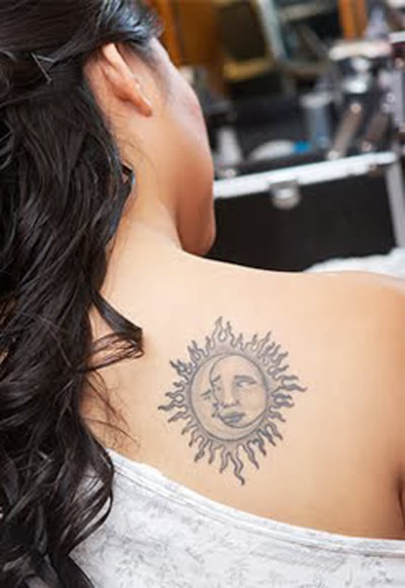 Grey Ink Sun Tattoo On Back Shoulder For Girls in proportions 800 X 1161