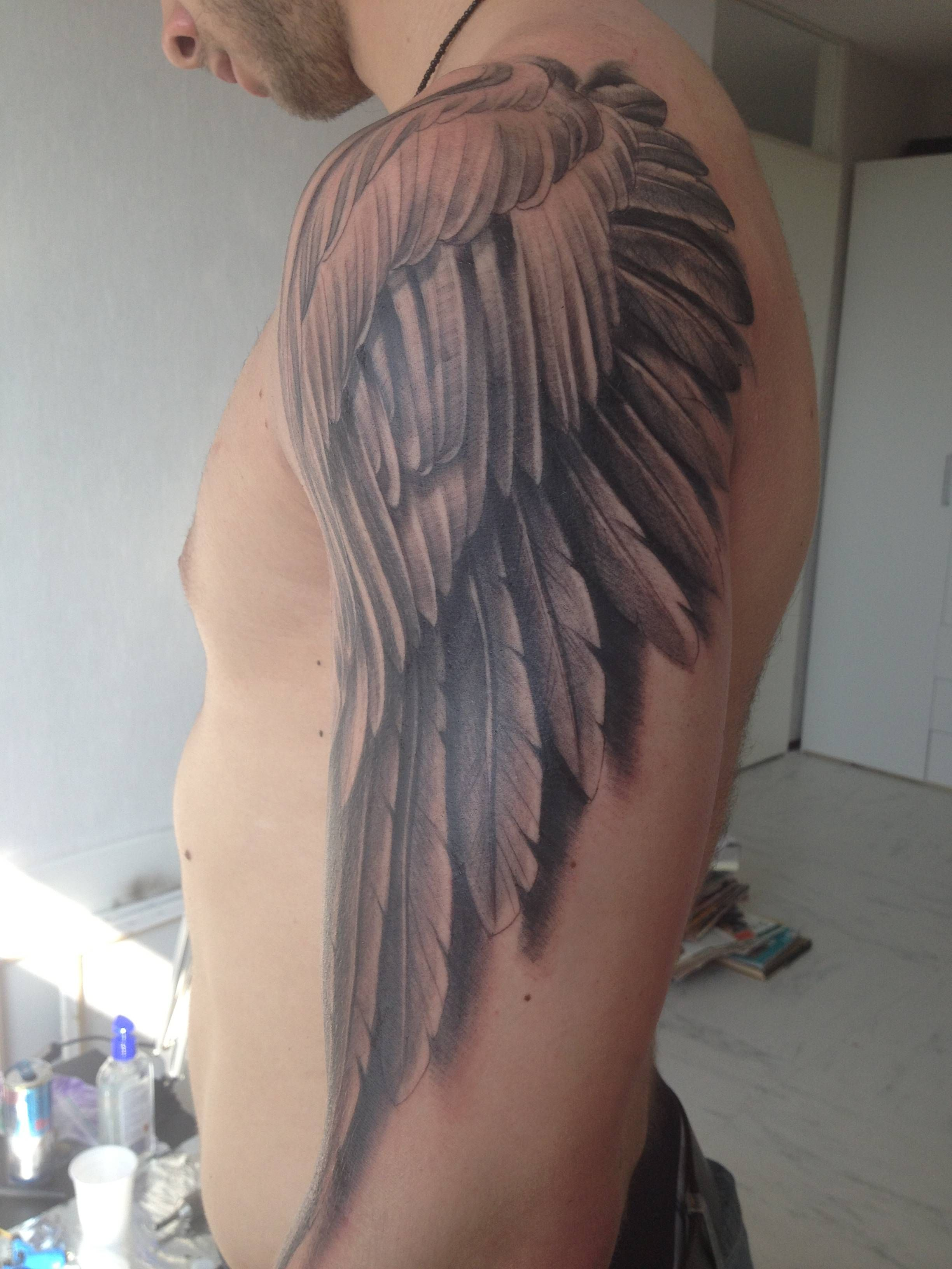Insanely Great Angel Wing On The Arm Sleeve Optical Illusion throughout sizing 2448 X 3264