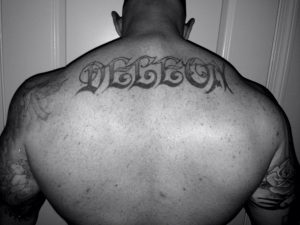 Last Name Across Shoulder Blades Tattoos Tattoo Ideas Tattoos inside size 1136 X 852