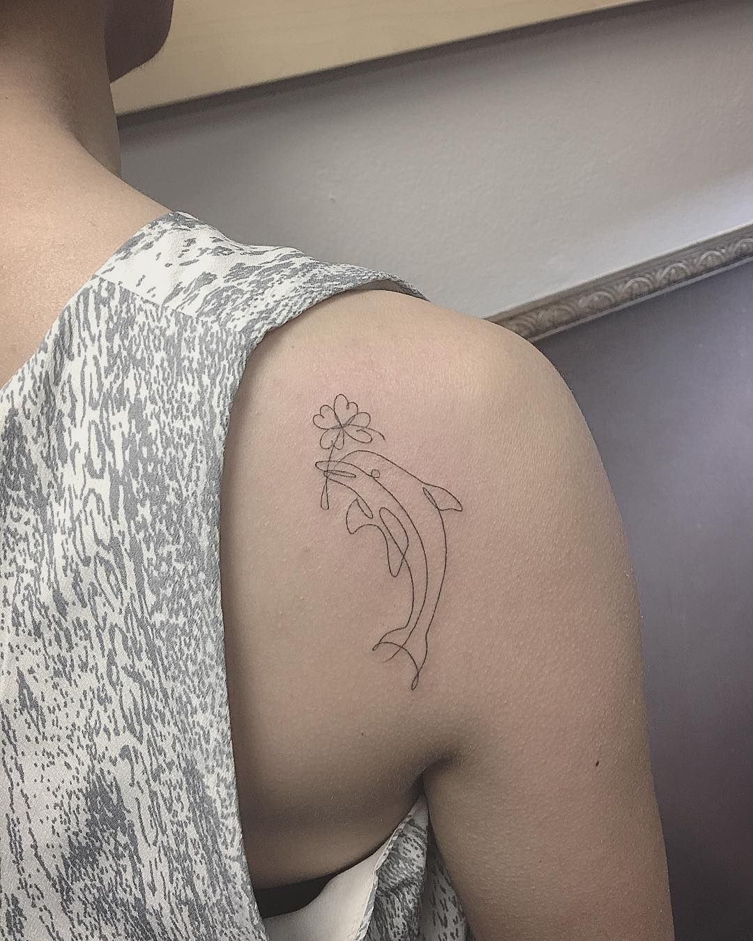 Minimalist Dolphin On Back Shoulder Tattoos On Women intended for measurements 1080 X 1349