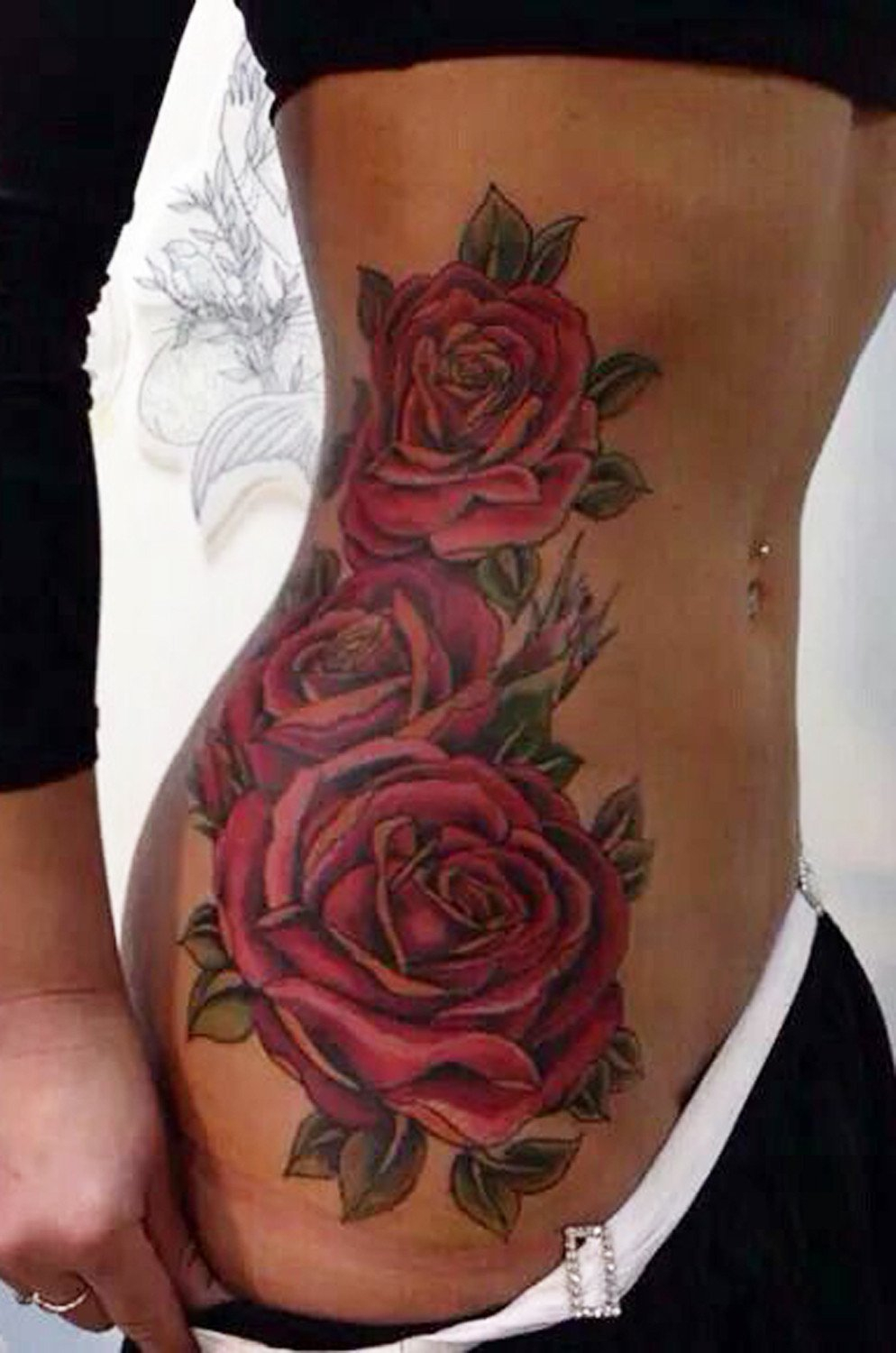 Red Roses Full Rib Tattoo Idea For Girls pertaining to size 994 X 1500