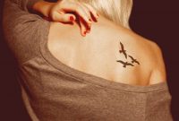 Three Black Little Bird Tattoo On Girl Back Shoulder regarding sizing 1252 X 1252