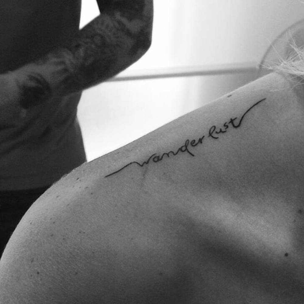 Top Of The Shoulder Tattoo Saying Wanderlust On regarding proportions 1000 X 1000