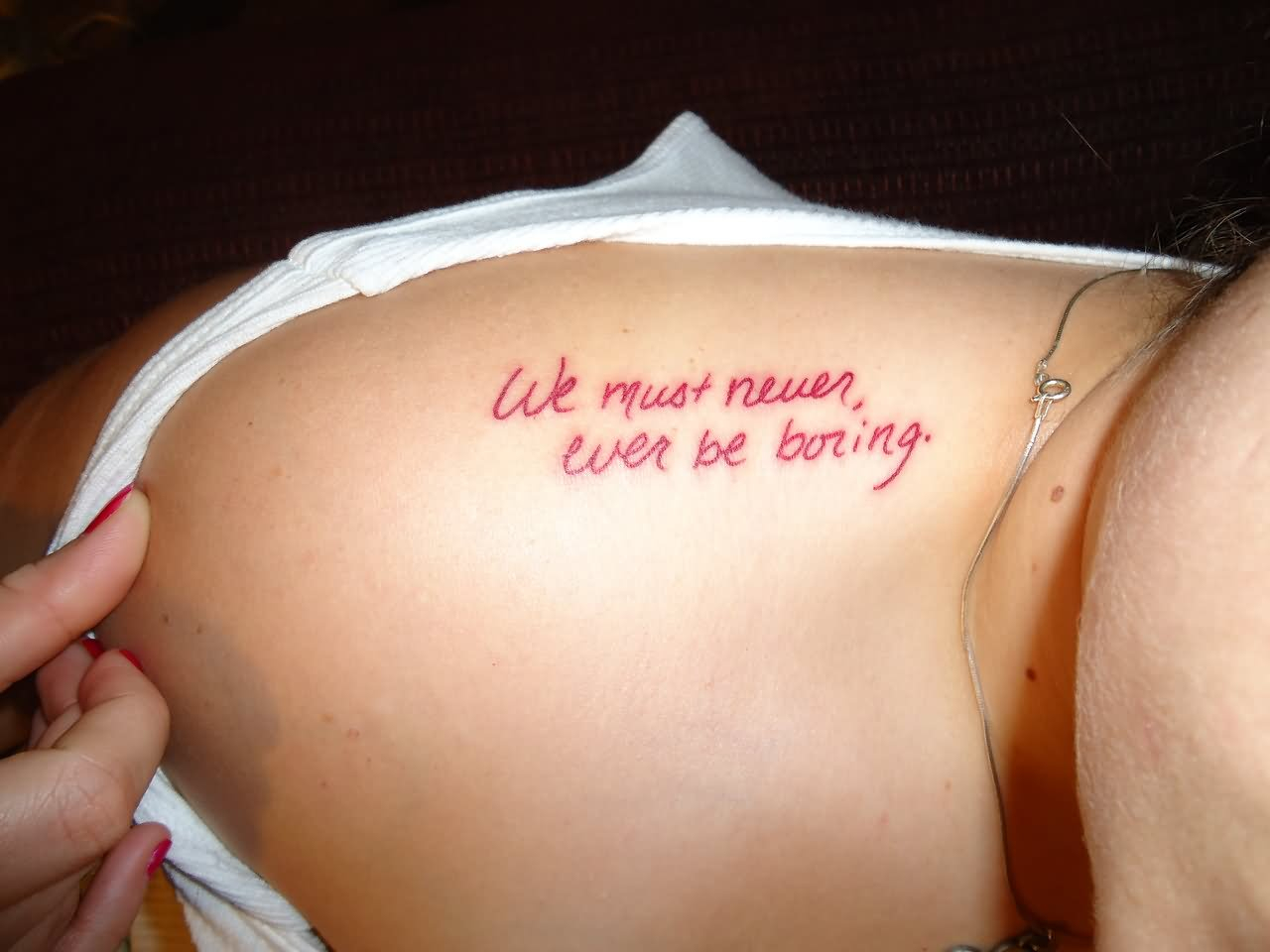 We Must Never Ever Be Boring Literary Tattoo On Girl Upper Shoulder inside proportions 1280 X 960