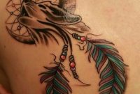 Wolf In A Dream Catcher Tattoo On The Shoulder Blade Done with measurements 833 X 960